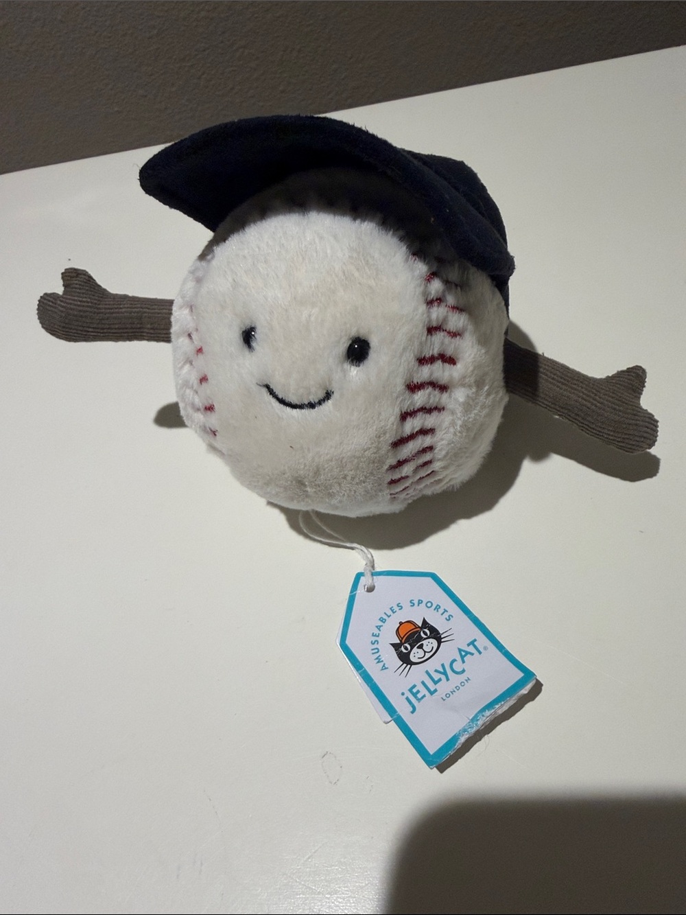 Jellycat White Plush Baseball with Navy Cap and Brown Arms